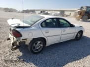 ✅ 2004 Pontiac Grand Am GT • VIN: 1G2NW52E74C189023 • Лот: 78256904. Опубликован ранее на Copart с пробегом 209 706 миль. Бесплатный доступ к архиву аукционных продаж из США и подробный отчёт об истории автомобиля на DreamBid. Изображение 3.