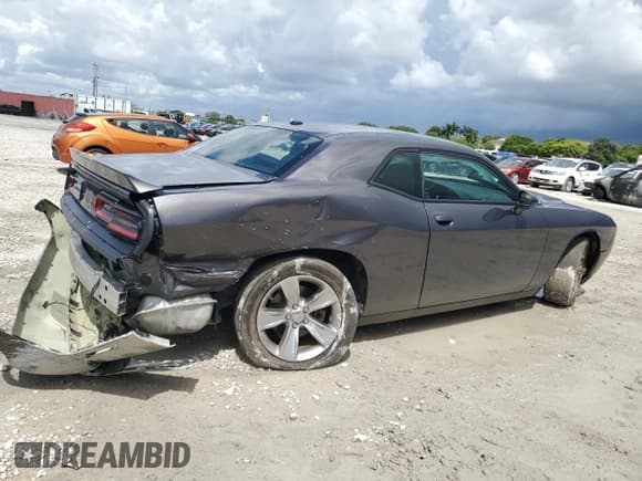 ✅ 2022 Dodge Challenger SXT • VIN: 2C3CDZAG7NH151877 • Lot: 69487744. Wystawiony na Copart z przebiegiem 45 583 mil. Bezpłatny archiwum sprzedaży aukcyjnych z USA i szczegółowy raport historii pojazdu na DreamBid. Zdjęcie 3.