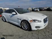 ✅ 2013 Jaguar XJ • VIN: SAJWA1C75D8V55556 • Лот: 70739925. Опубликован ранее на Copart с пробегом 52 274 миль. Бесплатный доступ к архиву аукционных продаж из США и подробный отчёт об истории автомобиля на DreamBid. Изображение 4.