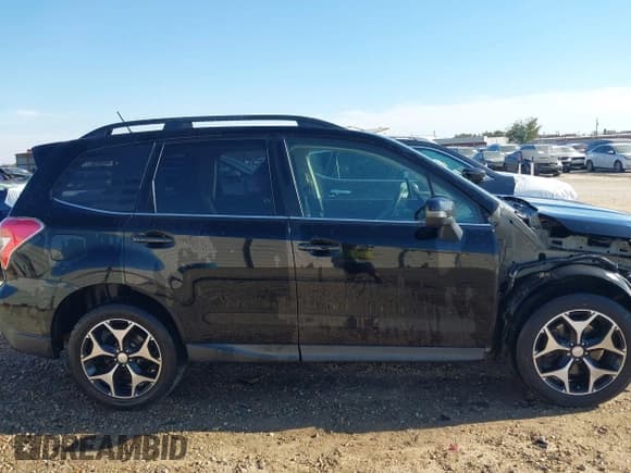 ✅ 2014 Subaru Forester XT Touring • VIN: JF2SJGMC2EH440413 • Лот: 43642606. Опубликован ранее на IAAI с пробегом 221 435 миль. Бесплатный доступ к архиву аукционных продаж из США и подробный отчёт об истории автомобиля на DreamBid. Изображение 13.