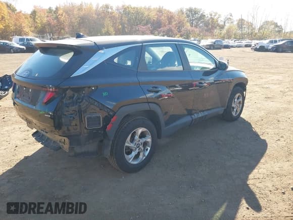 ✅ 2022 Hyundai Tucson SE • VIN: 5NMJACAE0NH053009 • Lot: 43550808. Listed on IAAI with 48,601 mi. Free auction sales archive from the USA and detailed vehicle history report at DreamBid. Image 4.
