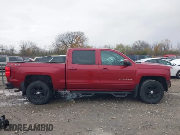 ✅ 2018 Chevrolet Silverado 1500 LT • VIN: 3GCUKREC6JG585828 • Lot: 43659037. Listed on IAAI with 130,703 mi. Free auction sales archive from the USA and detailed vehicle history report at DreamBid. Image 14.