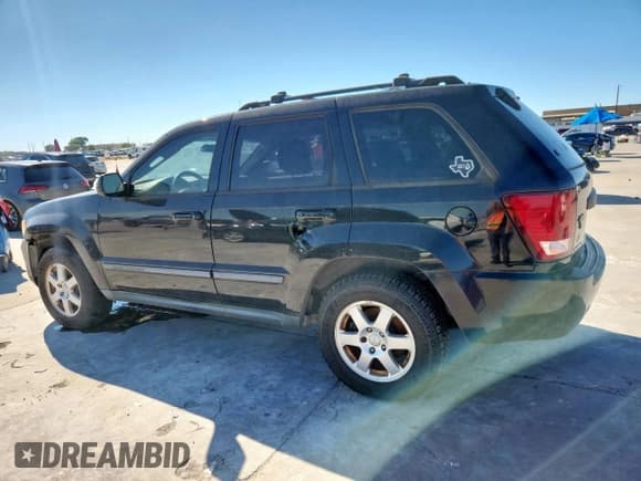 ✅ 2008 Jeep Grand Cherokee Laredo • VIN: 1J8GS48K68C153846 • Лот: 91123235. Опубликован ранее на Copart с пробегом 206 298 миль. Бесплатный доступ к архиву аукционных продаж из США и подробный отчёт об истории автомобиля на DreamBid. Изображение 2.