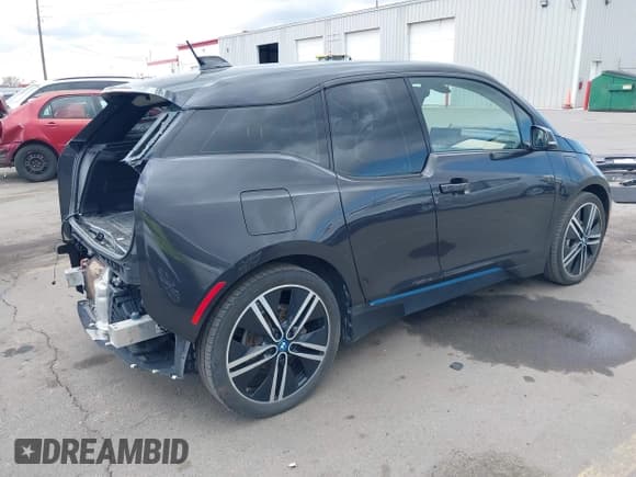 ✅ 2015 BMW i3 • VIN: WBY1Z4C57FV501034 • Lot: 41950152. Listed on IAAI with 47,207 mi. Free auction sales archive from the USA and detailed vehicle history report at DreamBid. Image 4.
