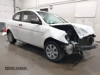 2011 Hyundai Accent GS z VIN KMHCM3ACXBU207112, wystawiony jako IAAI lot #42218697 z przebiegiem 117 627 mil mil oraz . Historia ofert i sprzedaży dostępna na DreamBid. Obrazek 1.
