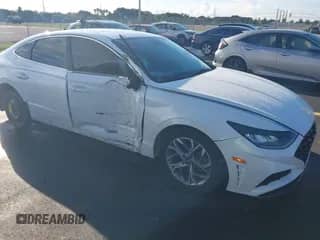 2021 Hyundai Sonata SEL z VIN KMHL64JA7MA152895, wystawiony jako IAAI lot #43415451 z przebiegiem 42 767 mil mil oraz . Historia ofert i sprzedaży dostępna na DreamBid. Obrazek 1.