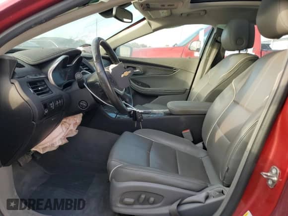 2014 Chevrolet Impala LTZ with VIN 1G1155S36EU145708, listed as a Copart auction lot 82423055 with 140,731 mi miles and Salvage title. Bid and sale history available at DreamBid. Image 7.