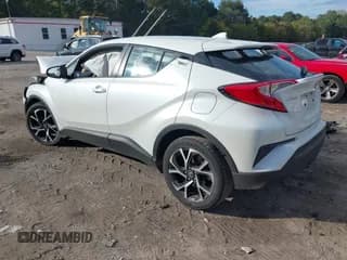 ✅ 2018 Toyota C-HR XLE • VIN: NMTKHMBX3JR011591 • Лот: 43309934. Опубликован ранее на IAAI с пробегом 165 730 миль. Бесплатный доступ к архиву аукционных продаж из США и подробный отчёт об истории автомобиля на DreamBid. Изображение 3.