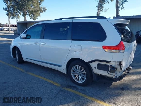 ✅ 2014 Toyota Sienna XLE • VIN: 5TDYK3DC3ES415711 • Lot: 43643569. Listed on IAAI with 205,322 mi. Free auction sales archive from the USA and detailed vehicle history report at DreamBid. Image 3.