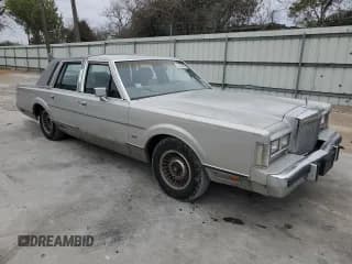 ✅ 1986 Lincoln Town Car • VIN: 1LNBP96F6GY708149 • Lot: 87865665. Listed on Copart with 28,627 mi. Free auction sales archive from the USA and detailed vehicle history report at DreamBid. Image 4.