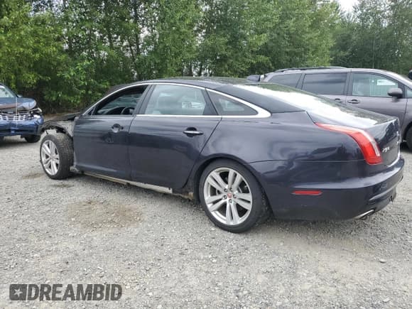 ✅ 2016 Jaguar XJ Portfolio • VIN: SAJWJ2GDXG8V93228 • Lot: 62832115. Listed on Copart with 45,536 mi. Free auction sales archive from the USA and detailed vehicle history report at DreamBid. Image 2.