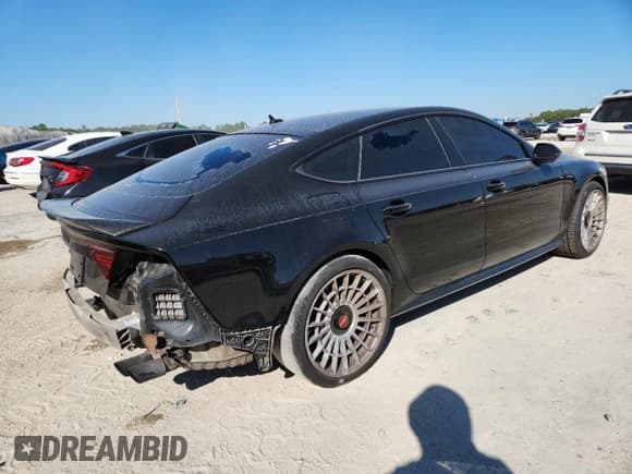 ✅ 2016 Audi S7 • VIN: WAUW2BFC9GN135490 • Лот: 91205115. Опубликован ранее на Copart с пробегом 113 980 миль. Бесплатный доступ к архиву аукционных продаж из США и подробный отчёт об истории автомобиля на DreamBid. Изображение 3.