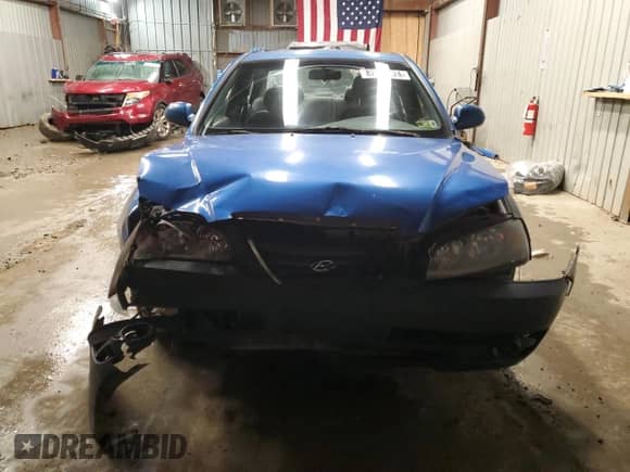 2005 Hyundai Elantra GLS z VIN KMHDN46D05U186414, wystawiony jako Copart lot #82921324 z przebiegiem 141 258 mil mil oraz Szkoda całkowita • Salvage title. Historia ofert i sprzedaży dostępna na DreamBid. Obrazek 5.