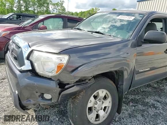 ✅ 2014 Toyota Tacoma PreRunner • VIN: 5TFJU4GN2EX054013 • Lot: 56953795. Listed on Copart with 183,484 mi. Free auction sales archive from the USA and detailed vehicle history report at DreamBid. Image 13.