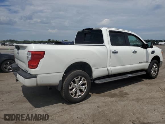 ✅ 2017 Nissan Titan SV • VIN: 1N6AA1F28HN502542 • Лот: 67795974. Опубликован ранее на Copart с пробегом 158 669 миль. Бесплатный доступ к архиву аукционных продаж из США и подробный отчёт об истории автомобиля на DreamBid. Изображение 3.