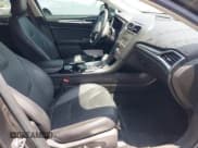 ✅ 2016 Ford Fusion Titanium • VIN: 3FA6P0SU1GR304590 • Лот: 42381545. Опубликован ранее на IAAI с пробегом 136 684 миль. Бесплатный доступ к архиву аукционных продаж из США и подробный отчёт об истории автомобиля на DreamBid. Изображение 5.