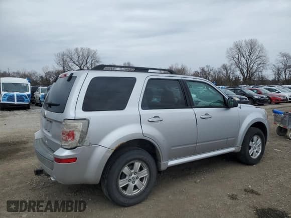 ✅ 2010 Mercury Mariner • VIN: 4M2CN9B75AKJ24200 • Lot: 49974115. Listed on Copart with 211,348 mi. Free auction sales archive from the USA and detailed vehicle history report at DreamBid. Image 3.