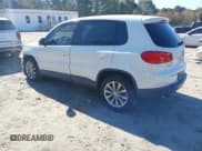 ✅ 2014 Volkswagen Tiguan S • VIN: WVGBV3AX1EW042765 • Лот: 43627407. Опубликован ранее на IAAI с пробегом 154 339 миль. Бесплатный доступ к архиву аукционных продаж из США и подробный отчёт об истории автомобиля на DreamBid. Изображение 3.