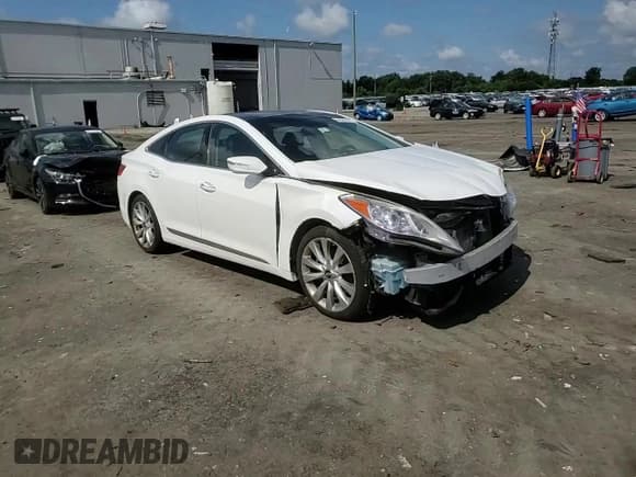 ✅ 2013 Hyundai Azera • VIN: KMHFH4JG4DA198826 • Лот: 64582555. Опубликован ранее на Copart с пробегом 133 149 миль. Бесплатный доступ к архиву аукционных продаж из США и подробный отчёт об истории автомобиля на DreamBid. Изображение 13.