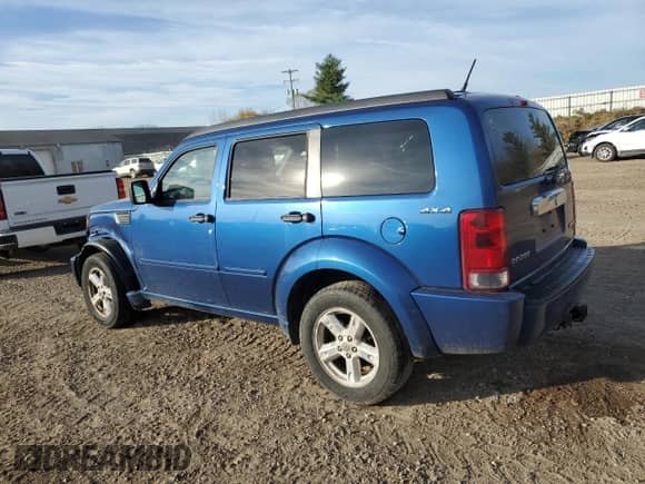 2010 Dodge Nitro SXT z VIN 1D4PU5GK4AW127309, wystawiony jako Copart lot #77405514 z przebiegiem 247 526 mil mil oraz Czysty tytuł • Clean title. Historia ofert i sprzedaży dostępna na DreamBid. Obrazek 2.