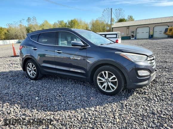 ✅ 2015 Hyundai Santa Fe • VIN: 5XYZUDLA7FG285886 • Лот: 90075335. Опубликован ранее на Copart с пробегом 211 802 миль. Бесплатный доступ к архиву аукционных продаж из США и подробный отчёт об истории автомобиля на DreamBid. Изображение 4.