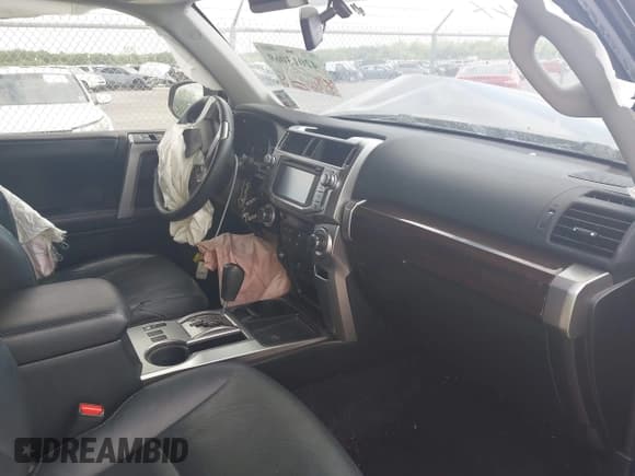 ✅ 2016 Toyota 4Runner SR5 • VIN: JTEZU5JR7G5143641 • Lot: 42013069. Listed on IAAI with 101,753 mi. Free auction sales archive from the USA and detailed vehicle history report at DreamBid. Image 5.