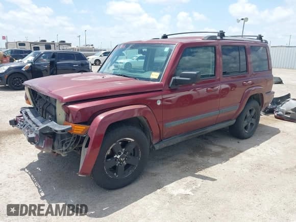 ✅ 2007 Jeep Commander Sport • VIN: 1J8HG48P87C618000 • Lot: 42705799. Listed on IAAI with 207,938 mi. Free auction sales archive from the USA and detailed vehicle history report at DreamBid. Image 2.
