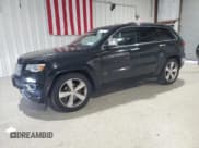 ✅ 2014 Jeep Grand Cherokee Overland • VIN: 1C4RJFCG5EC467601 • Lot: 82082095. Listed on Copart with 127,001 mi. Free auction sales archive from the USA and detailed vehicle history report at DreamBid. Image 1.