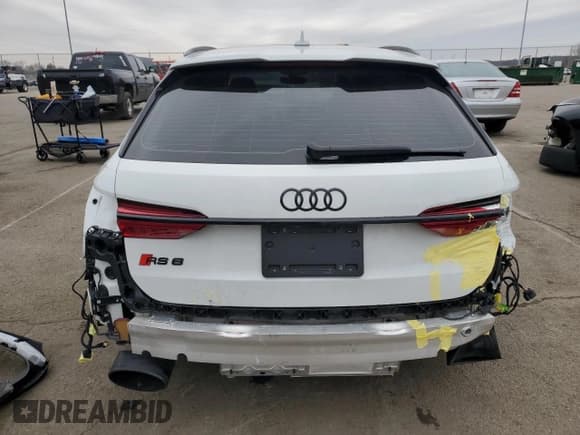 ✅ 2022 Audi RS 6 • VIN: WUA1CBF29NN900733 • Лот: 43704725. Опубликован ранее на Copart с пробегом 27 982 миль. Бесплатный доступ к архиву аукционных продаж из США и подробный отчёт об истории автомобиля на DreamBid. Изображение 6.