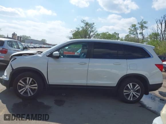 ✅ 2018 Honda Pilot EX-L • VIN: 5FNYF6H57JB045332 • Lot: 42064344. Listed on IAAI with 140,129 mi. Free auction sales archive from the USA and detailed vehicle history report at DreamBid. Image 15.