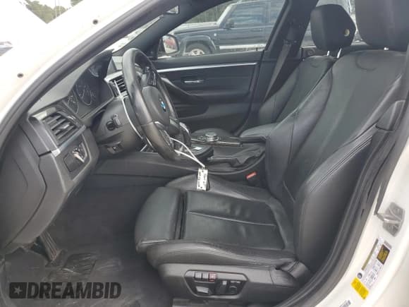 ✅ 2015 BMW 4 Series 428i • VIN: WBA4A5C57FG052581 • Lot: 84033205. Listed on Copart with 76,638 mi. Free auction sales archive from the USA and detailed vehicle history report at DreamBid. Image 7.