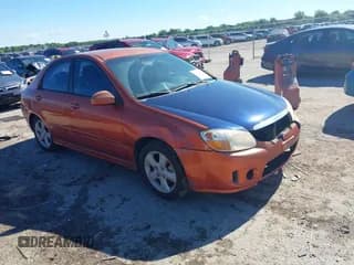 ✅ 2009 Kia Spectra EX • VIN: KNAFE221195026584 • Lot: 42220442. Listed on IAAI with 181,619 mi. Free auction sales archive from the USA and detailed vehicle history report at DreamBid. Image 1.