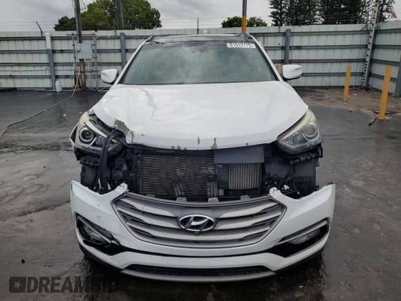 ✅ 2018 Hyundai Santa Fe Ultimate • VIN: 5XYZW4LA9JG537852 • Лот: 81812715. Опубликован ранее на Copart с пробегом 124 269 миль. Бесплатный доступ к архиву аукционных продаж из США и подробный отчёт об истории автомобиля на DreamBid. Изображение 5.