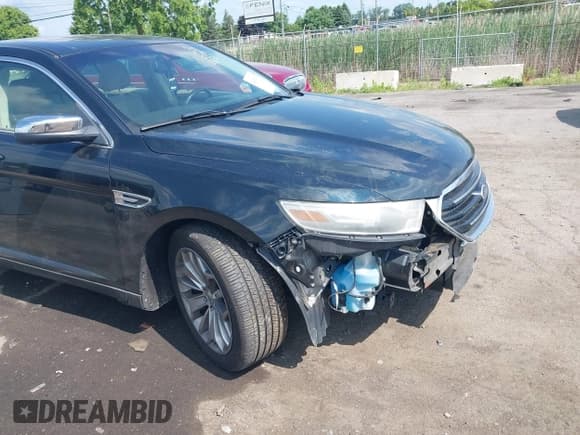 ✅ 2014 Ford Taurus Limited • VIN: 1FAHP2F85EG125118 • Lot: 42457437. Listed on IAAI with 129,406 mi. Free auction sales archive from the USA and detailed vehicle history report at DreamBid. Image 6.