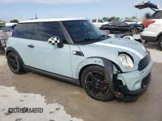 2012 MINI Hardtop with VIN WMWSU3C52CT367682, listed as a Copart auction lot 63045965 with 124,683 mi miles and Salvage title. Bid and sale history available at DreamBid. Image 4.