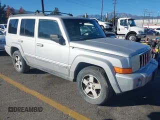 ✅ 2010 Jeep Commander Sport • VIN: 1J4RG4GK0AC112941 • Lot: 43895334. Listed on IAAI with 212,257 mi. Free auction sales archive from the USA and detailed vehicle history report at DreamBid. Image 1.