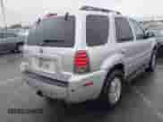 2005 Mercury Mariner Luxury z VIN 4M2CU561X5DJ16539, wystawiony jako IAAI lot #41572981 z przebiegiem 157 461 mil mil oraz . Historia ofert i sprzedaży dostępna na DreamBid. Obrazek 4.