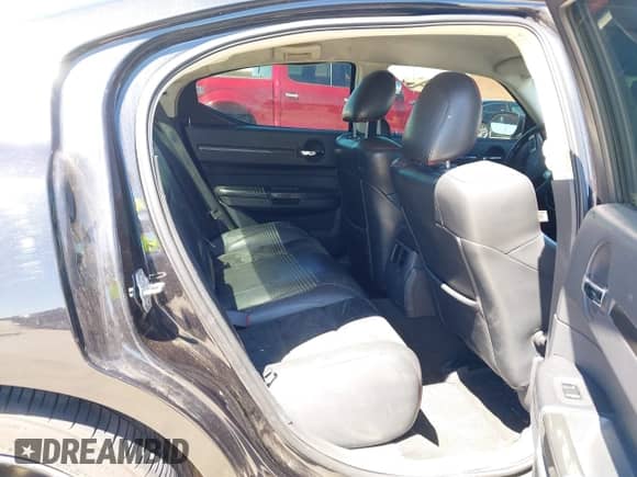 2009 Dodge Charger SRT-8 с VIN 2B3LA73W29H568764, выставлен на аукционе IAAI как лот 41869358 с пробегом 96 029 миль миль и . История ставок и продаж доступна на DreamBid. Изображение 8.