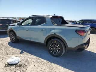 2023 Hyundai Santa Cruz SEL Premium z VIN 5NTJDDAF5PH055478, wystawiony jako Copart lot #49303904 z przebiegiem 2 690 mil mil oraz Szkoda całkowita • Salvage title. Historia ofert i sprzedaży dostępna na DreamBid. Obrazek 2.