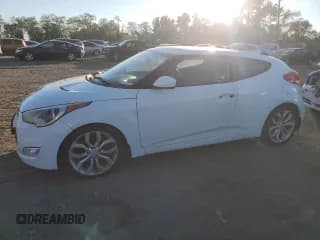 ✅ 2012 Hyundai Veloster w/Red Int • VIN: KMHTC6AD7CU078714 • Lot: 77092214. Wystawiony na Copart z przebiegiem 154 037 mil. Bezpłatny archiwum sprzedaży aukcyjnych z USA i szczegółowy raport historii pojazdu na DreamBid. Zdjęcie 1.