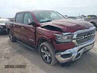 ✅ 2020 Ram 1500 Laramie • VIN: 1C6SRFJT9LN331989 • Lot: 43321698. Listed on IAAI with 68,157 mi. Free auction sales archive from the USA and detailed vehicle history report at DreamBid. Image 1.