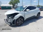 ✅ 2022 Toyota C-HR XLE • VIN: NMTKHMBX8NR147317 • Lot: 41969293. Listed on IAAI with 11,621 mi. Free auction sales archive from the USA and detailed vehicle history report at DreamBid. Image 2.