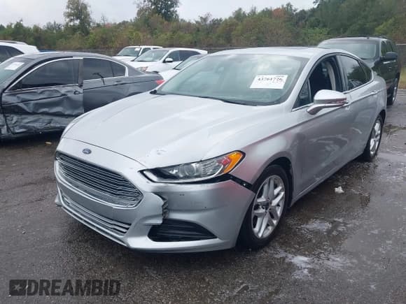 ✅ 2016 Ford Fusion SE • VIN: 3FA6P0H71GR331371 • Lot: 43761726. Listed on IAAI with 218,242 mi. Free auction sales archive from the USA and detailed vehicle history report at DreamBid. Image 2.