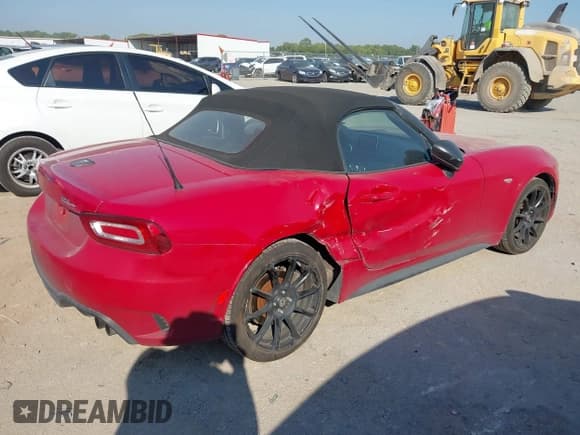 ✅ 2017 FIAT 124 Spider Classica • VIN: JC1NFAEK4H0124138 • Lot: 43345321. Listed on IAAI with 112,648 mi. Free auction sales archive from the USA and detailed vehicle history report at DreamBid. Image 4.