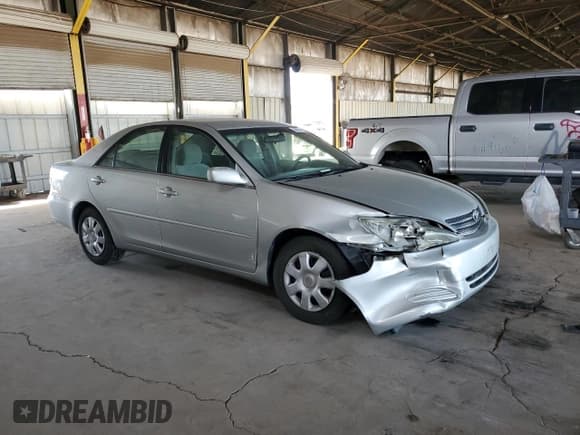 ✅ 2003 Toyota Camry XLE • VIN: 4T1BE30K43U731679 • Lot: 90932085. Listed on Copart with 169,701 mi. Free auction sales archive from the USA and detailed vehicle history report at DreamBid. Image 4.