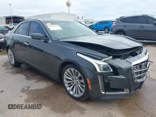 ✅ 2014 Cadillac CTS Luxury RWD • VIN: 1G6AR5S3XE0160637 • Lot: 41275679. Listed on IAAI with 195,765 mi. Free auction sales archive from the USA and detailed vehicle history report at DreamBid. Image 1.