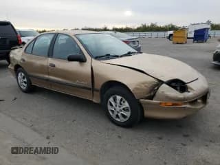 ✅ 1999 Pontiac Sunfire SE • VIN: 1G2JB5240X7567410 • Лот: 81315704. Опубликован ранее на Copart с пробегом 217 936 миль. Бесплатный доступ к архиву аукционных продаж из США и подробный отчёт об истории автомобиля на DreamBid. Изображение 4.