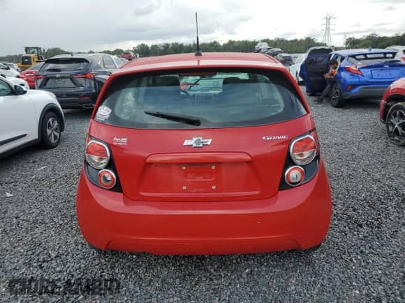 2012 Chevrolet Sonic LS с VIN 1G1JA6SH9C4118500, выставлен на аукционе Copart как лот 73918924 с пробегом Не указан миль и Списание • Salvage title. История ставок и продаж доступна на DreamBid. Изображение 6.