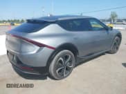 ✅ 2022 Kia EV6 Wind • VIN: KNDC3DLC6N5035363 • Лот: 42152655. Опубликован ранее на IAAI с пробегом 39 662 миль. Бесплатный доступ к архиву аукционных продаж из США и подробный отчёт об истории автомобиля на DreamBid. Изображение 4.