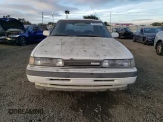 ✅ 1992 Mazda 626 • VIN: 1YVGD22B7N5214355 • Lot: 86899014. Listed on Copart with 89,811 mi. Free auction sales archive from the USA and detailed vehicle history report at DreamBid. Image 5.